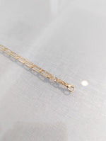 gold paperclip style bracelet with clasp