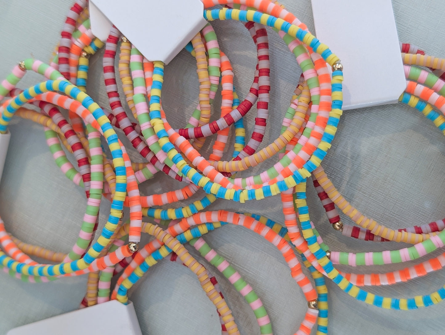 Multi Color Rubber Beaded Bracelets (5 in total)