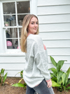 Oversized Grey Sweater with Pink Heart Motif and Pink detailing on Sleeves